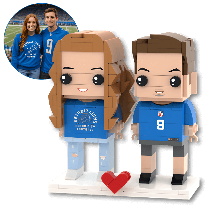 Two personalised mini figurines in sporting jerseys with a heart