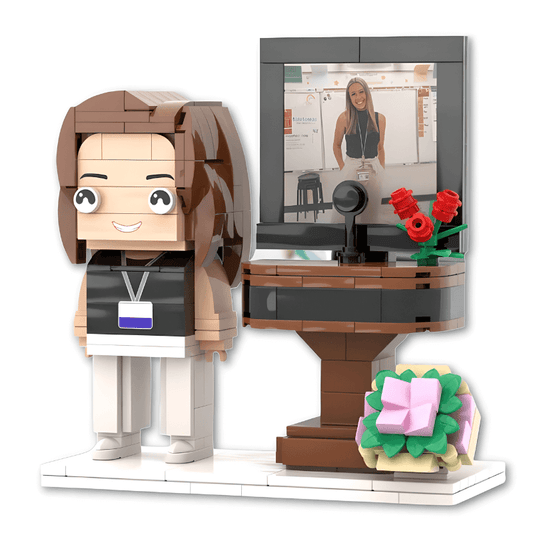 custom mini figure of a teacher with a desk setup and flowers on a white background