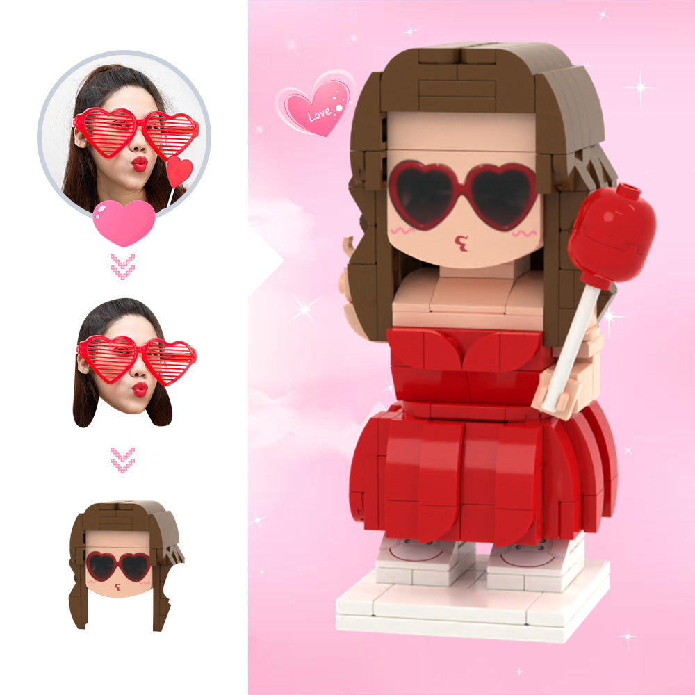 Custom brick figure of a girl with heart-shaped sunglasses and a red dress on a pink background