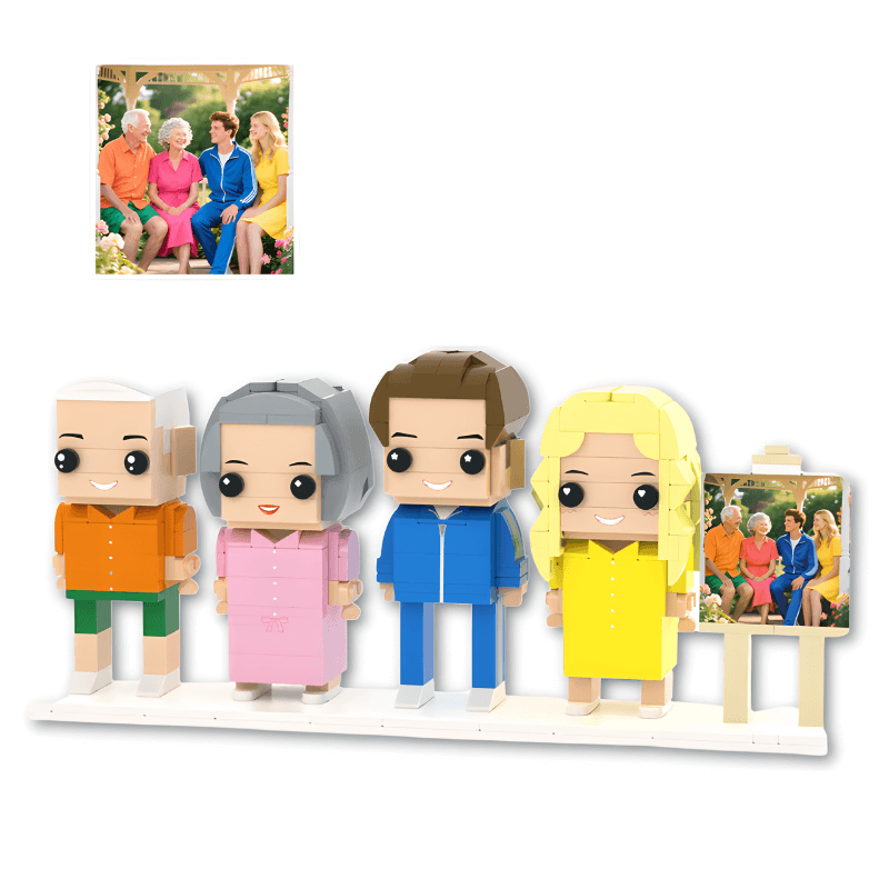 Set of 4 mini figurines of a family on a display stand with inset photos of a real family.