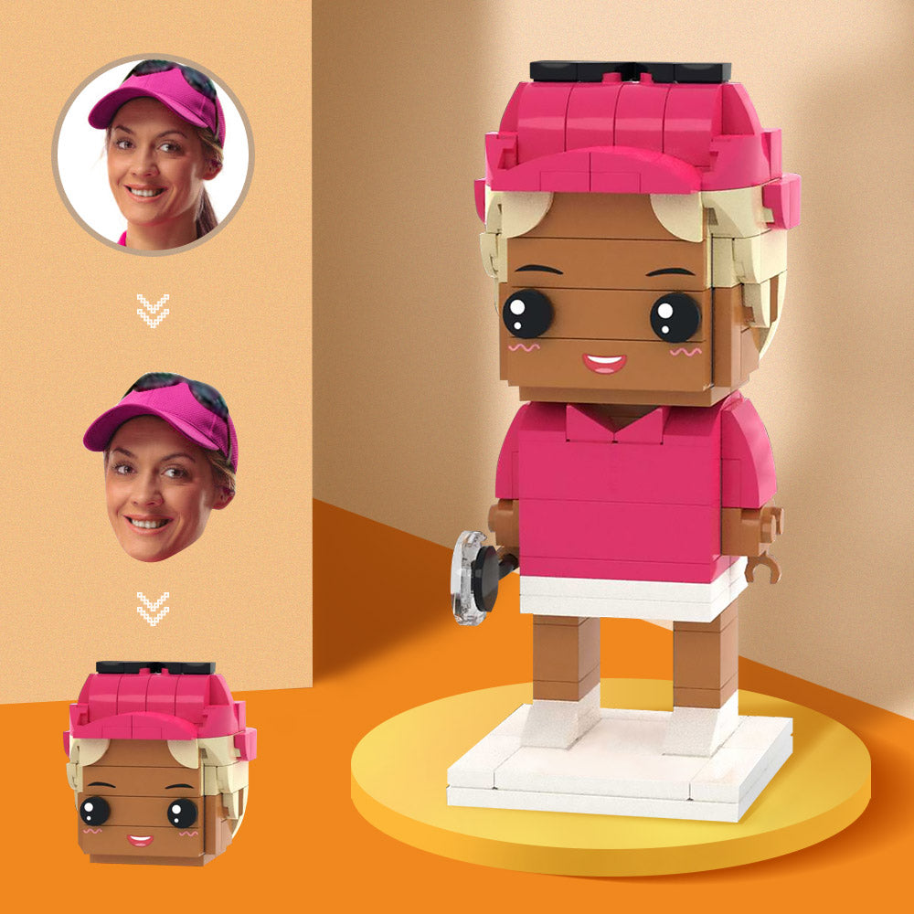 LEGO figure of a person with a pink cap and shirt holding a tennis racket