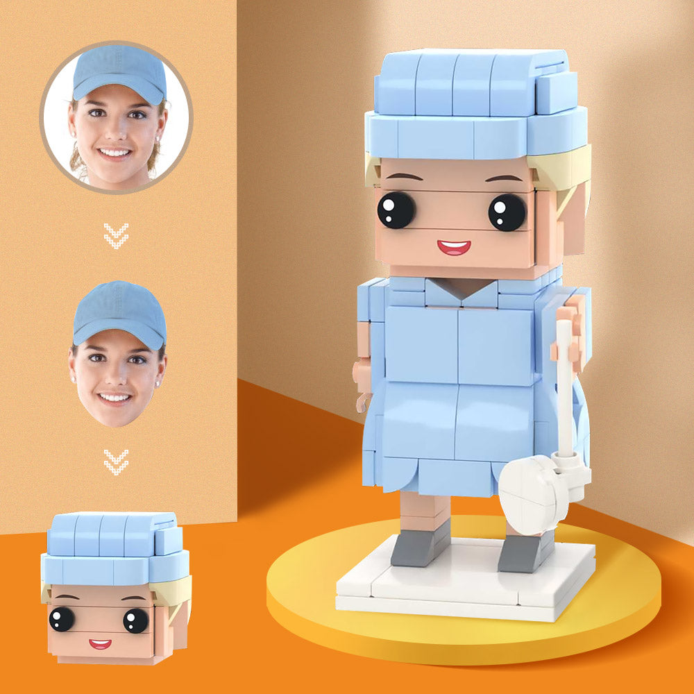 Custom brick figure of a female golfer with interchangeable face pieces and a golf club wearing a blue golf outfit