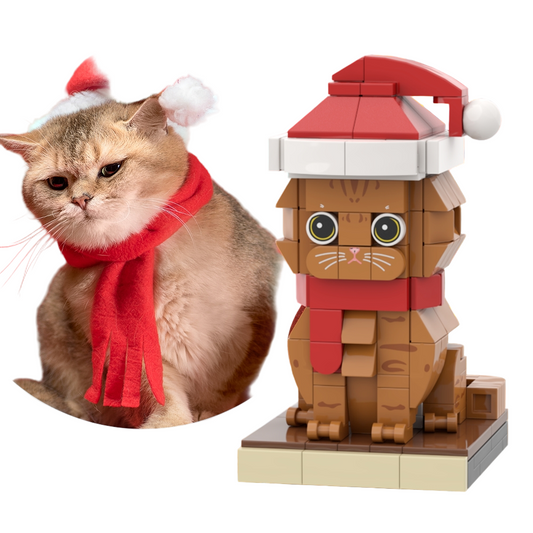 Cat wearing a Santa hat and scarf with a LEGO cat model in the background.