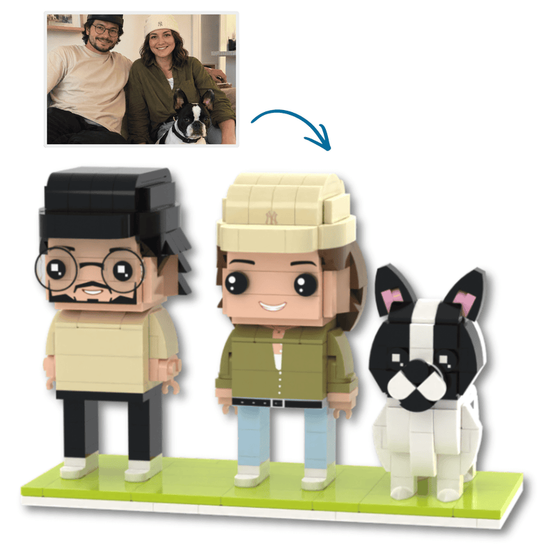 Custom brick figures set showing three assembled figures: a man with glasses and black hair, a woman in an olive green jacket and beige hat, and a black and white French Bulldog. An arrow points from a small photo of a couple and dog at the top left to the assembled figures below, on a white background.