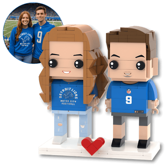 Two personalised mini figurines in sporting jerseys with a heart
