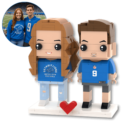 Two personalised mini figurines in sporting jerseys with a heart 