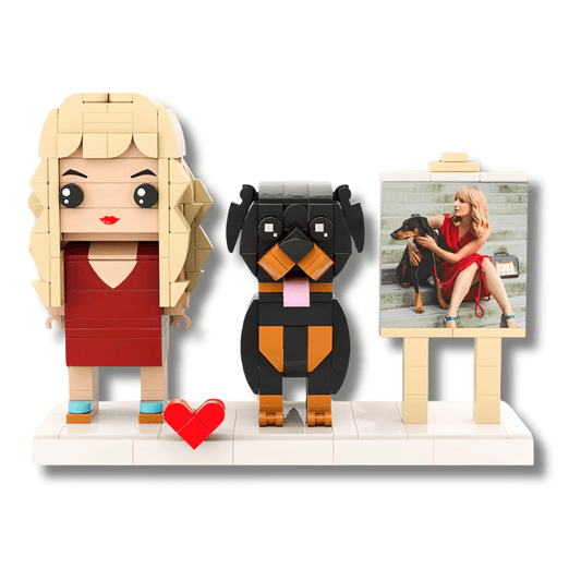 Custom brick figure of a woman with blonde hair and a dog, with a heart and photo stand in the background.