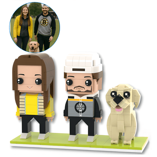 Three custom lego figures of a woman, a man, and a dog on a green baseplate with a small inset photo of a couple with a dog.