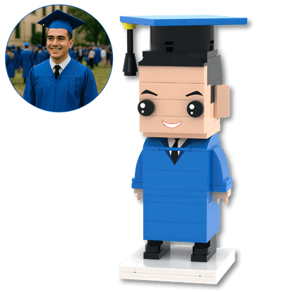 Graduation mini figure in blue gown and cap with inset photo of a real graduate.