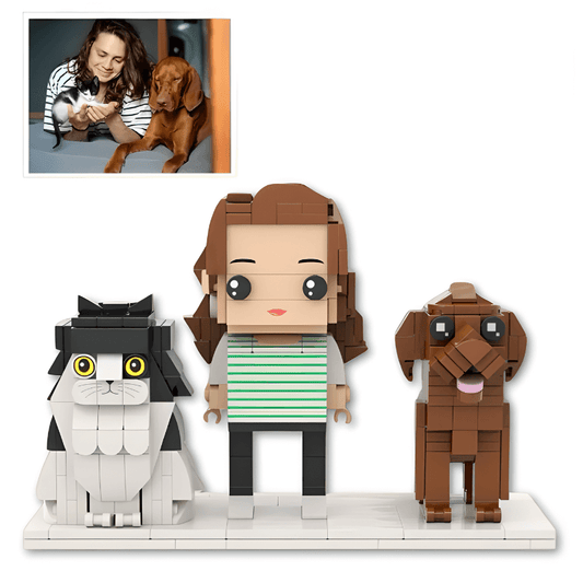 LEGO-like figurines of a person with a cat and dog, inspired by a real-life photo.