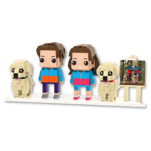 Personalised mini figures of two people and two dogs on a white base with a small easel displaying a photo.