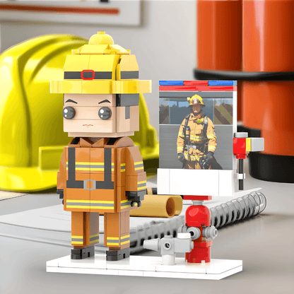Fireman custom mini figure made of interlocking bricks with a fire hydrant and hose in the background.