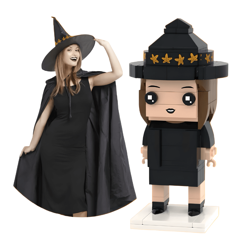 custom mini figure for halloween in a black witch costume next to a toy figure of a witch wearing a hat with stars.