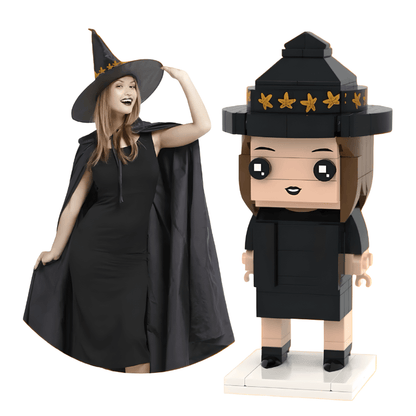 custom mini figure for halloween in a black witch costume next to a toy figure of a witch wearing a hat with stars.