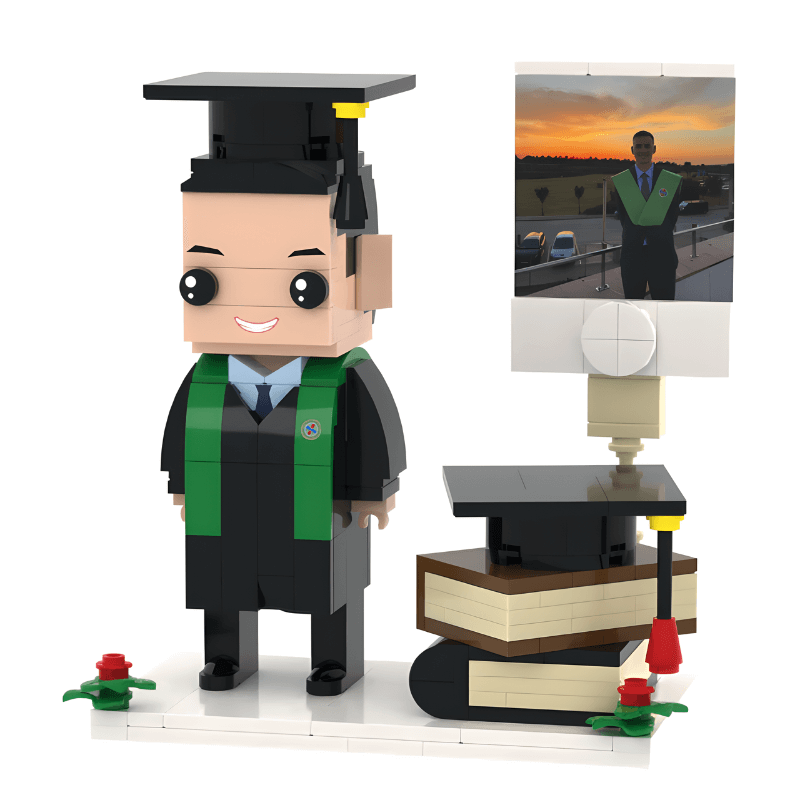 Lego Graduation minifigures with a figure and diploma, gown, cap and book stack