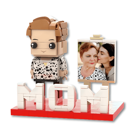 Toy figure of a child with a 'MOM' display and photo frame on a white background