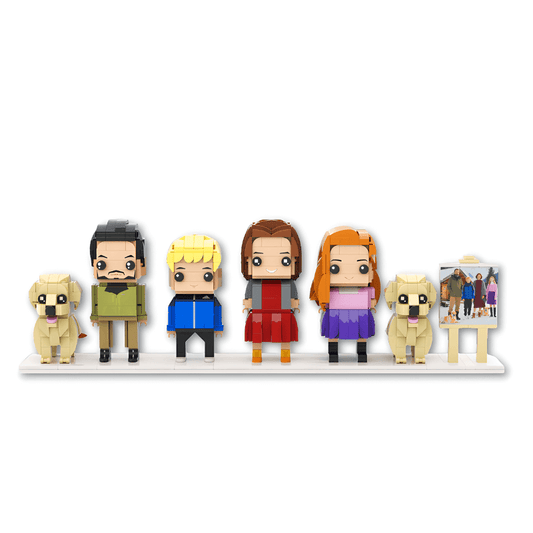 Custom mini figurines of people and dogs on a white background