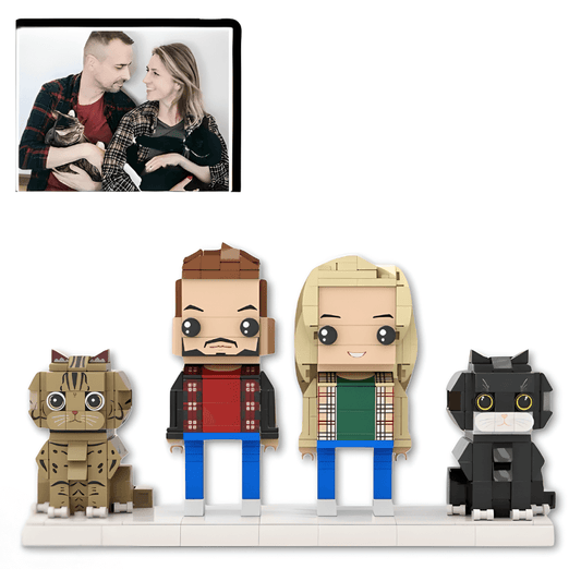 personalised mini figures of a couple and their cats with a photo of the couple holding a cat above them.