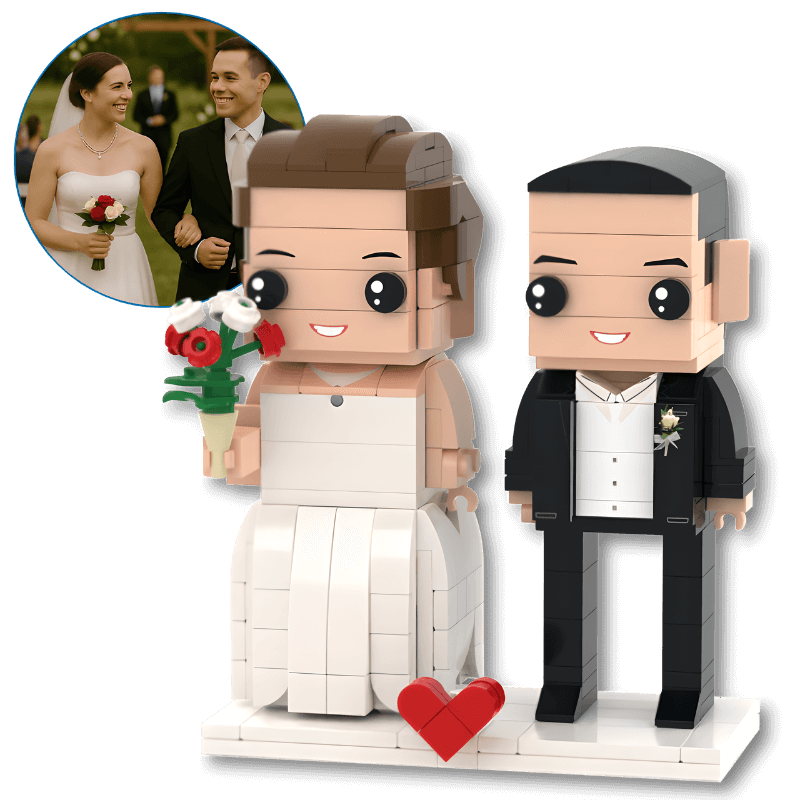 custom mini figures of a bride and groom with a heart-shaped base, inspired by a real wedding photo.