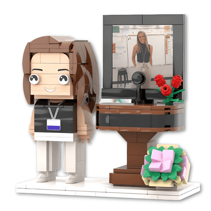 custom mini figure of a teacher with a desk setup and flowers on a white background